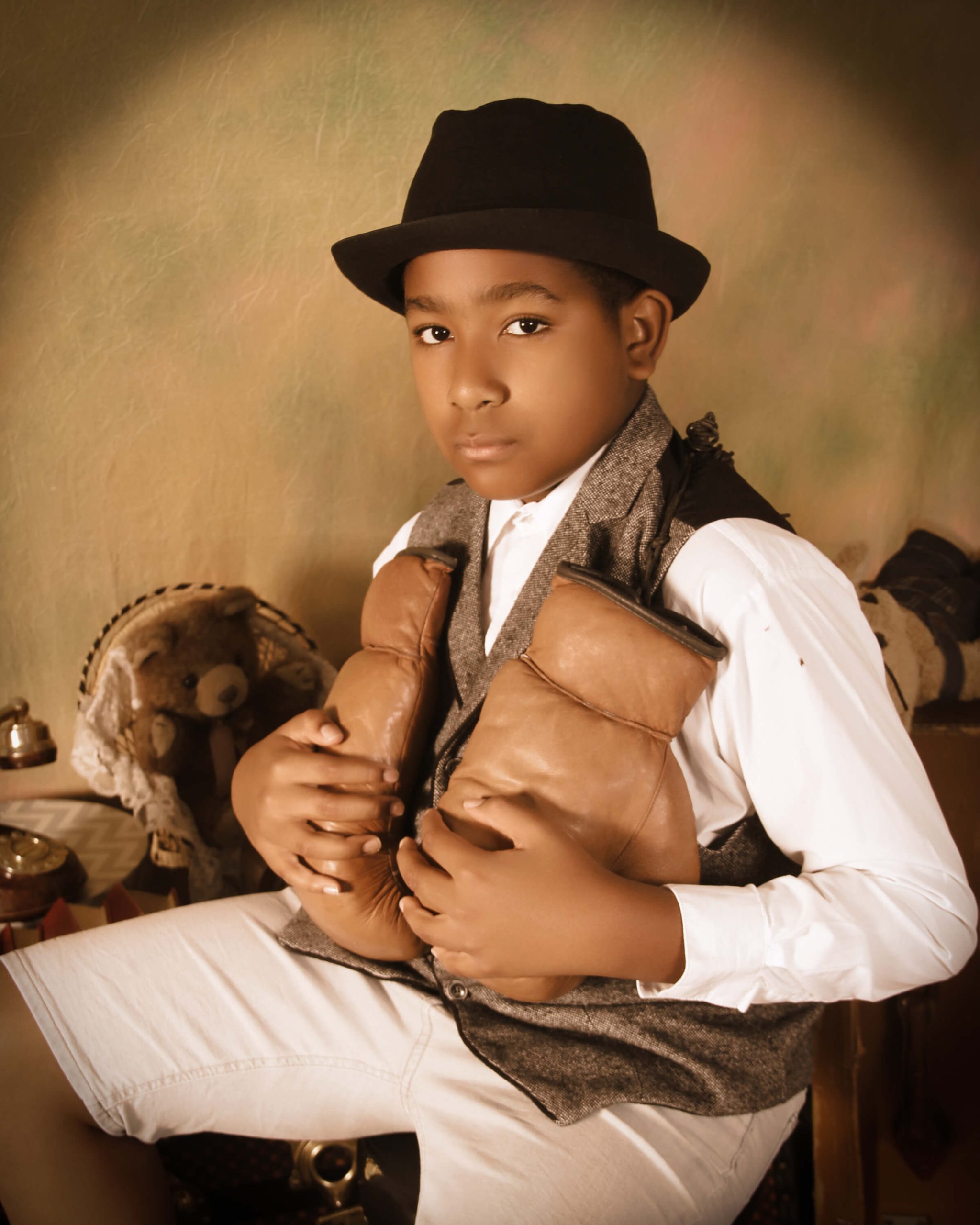 young black boy with hat on