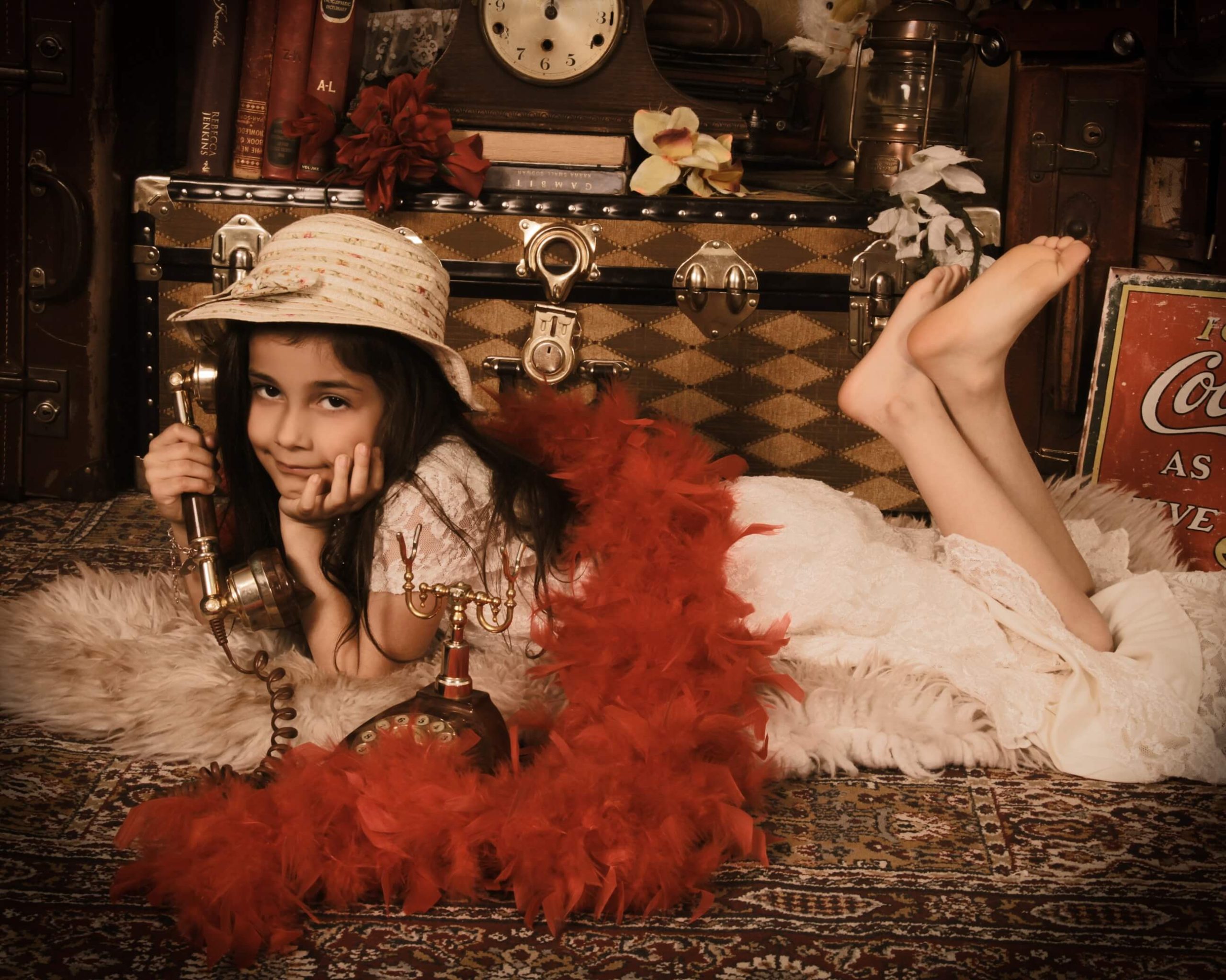 young girl lying on rug